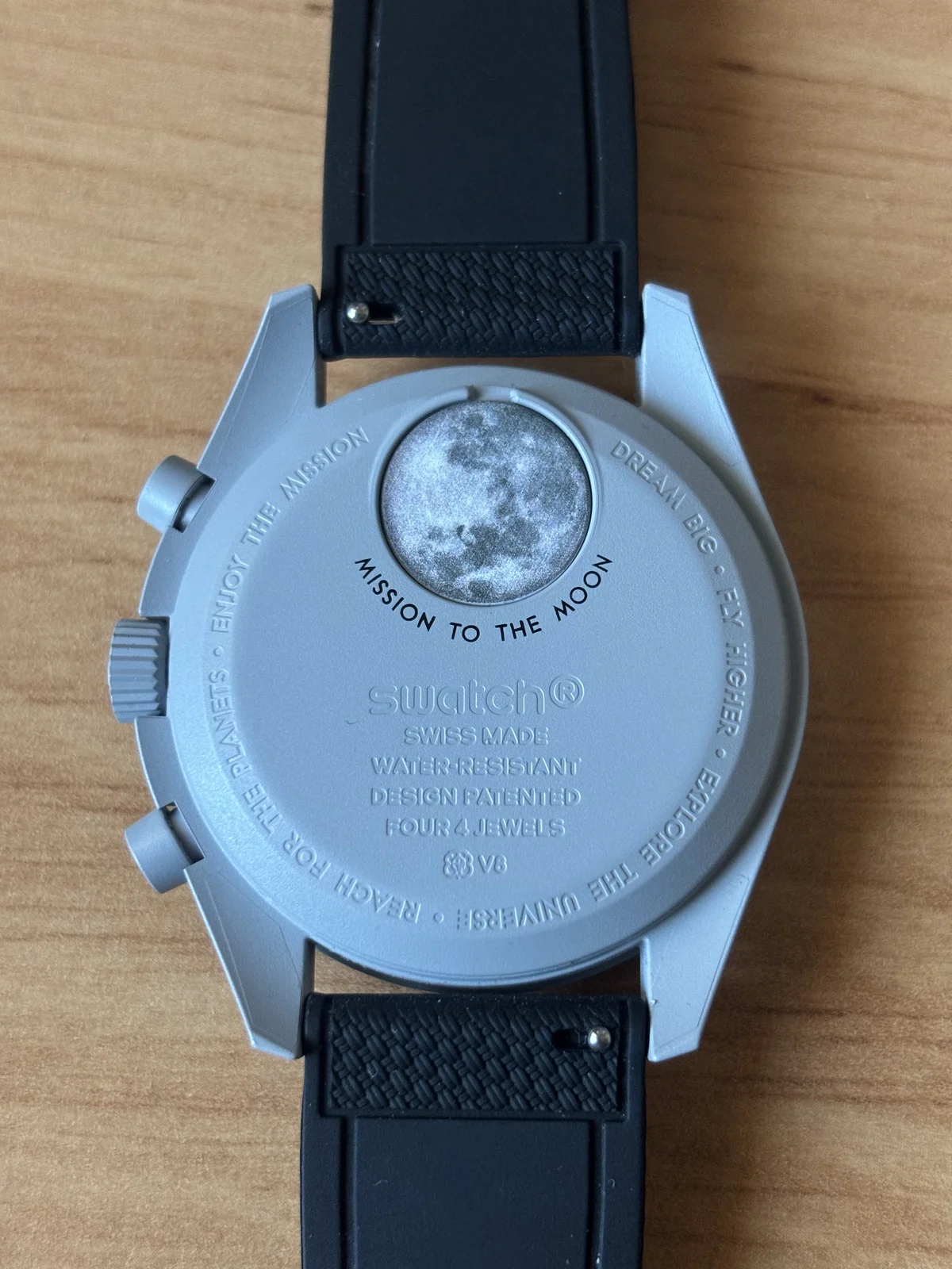 MoonSwatch Mission to the Moon caseback with an image of the Moon on the battery cover